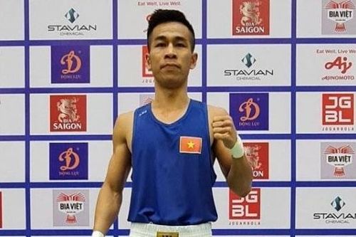 SEA Games 31: Võ sĩ boxing Việt Nam Trần Văn Thảo giành thắng lợi tuyệt đối trước đối thủ Indonesia