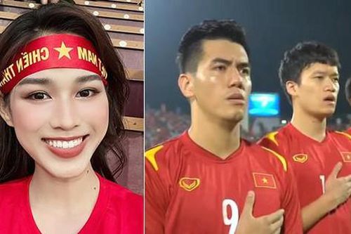 Hoa hậu Đỗ Thị Hà mặc áo cờ đỏ sao vàng, rạng rỡ trên sân Việt Trì cổ vũ tuyển Việt Nam
