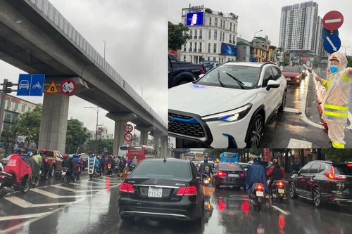 Phương tiện ùn ứ vì thời tiết xấu, Cảnh sát giao thông Thủ đô đội mưa phân luồng