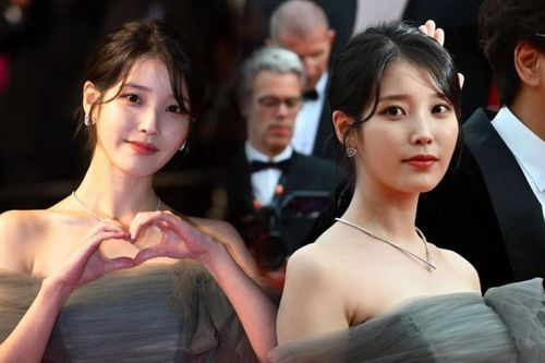 Hết bị đẩy đến bị viết nhầm tên trong phim, Cannes đang đối xử tệ với 'em gái quốc dân' IU?