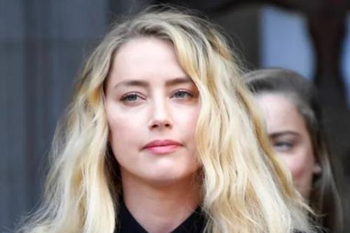 Vừa thua kiện chồng cũ, Amber Heard đã được 'người tốt hơn' gửi lời cầu hôn