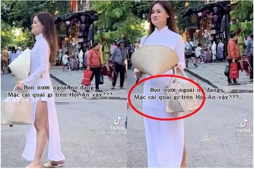 Nữ du khách mặc áo dài với quần đùi phản cảm ở Hội An