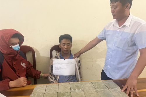 Đến khu vực giáp biên giới Việt - Lào mua 14 bánh heroin