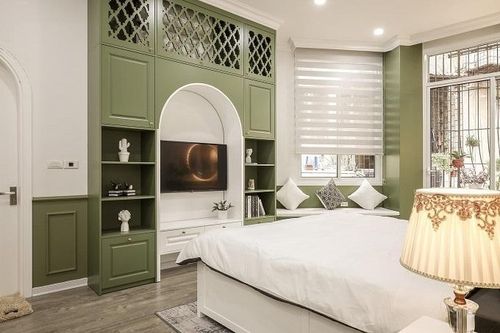 Cải tạo nhà phố chật màu xanh cốm theo phong cách cổ điển nhưng vẫn thoáng đãng