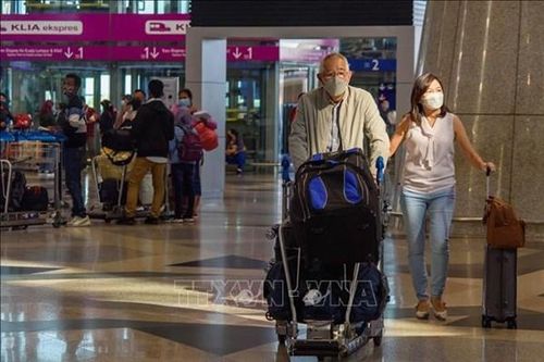 Malaysia đơn giản hóa thủ tục nhập cảnh