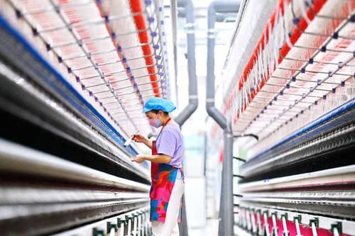 Hoạt động sản xuất của Trung Quốc bất ngờ giảm trong tháng Bảy