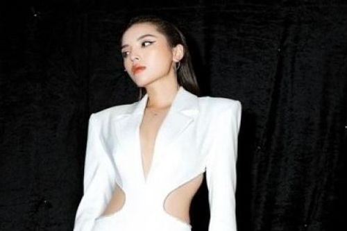 Thời trang khoe lưng thon, vai gầy của Hoa hậu Kỳ Duyên