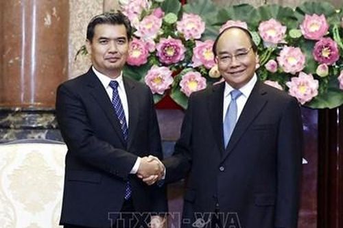 Chủ tịch nước Nguyễn Xuân Phúc tiếp Viện trưởng Viện Kiểm sát Nhân dân Tối cao Lào