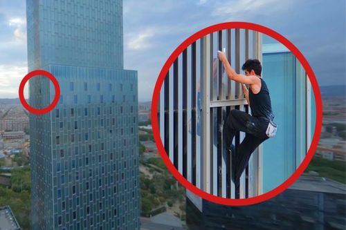 Tay không leo tòa tháp cao 122 m