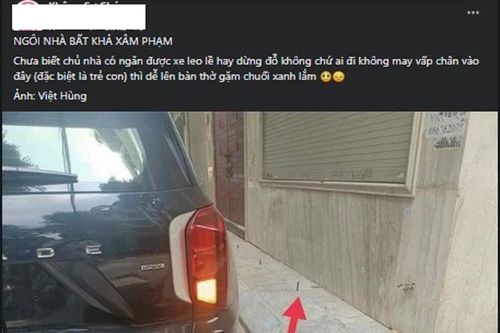 Tranh cãi việc chủ nhà đóng hàng cọc sắt để ngăn ô tô đậu trước cửa nhà