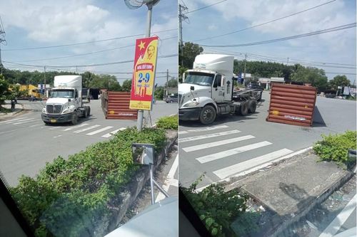 Thùng container chứa hàng chục tấn hàng rơi ra khỏi rơ moóc khi vào cua