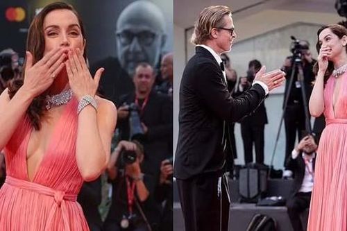 Bond Girl gốc Cuba mặc mốt không nội y, cười đùa với Brad Pitt trên thảm đỏ LHP Venice