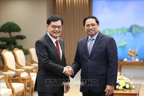 Thủ tướng Phạm Minh Chính tiếp Phó thủ tướng Singapore Heng Swee Keat