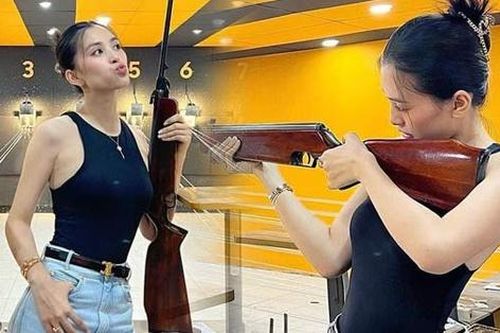 Tiểu Vy ấn tượng với hình ảnh đi bắn súng, diện áo ôm body