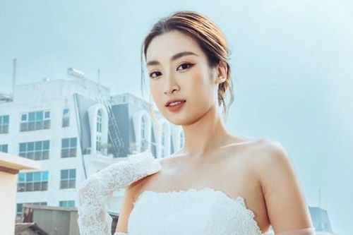 Hoa hậu Đỗ Mỹ Linh diện váy cưới phá cách trước khi lên xe hoa