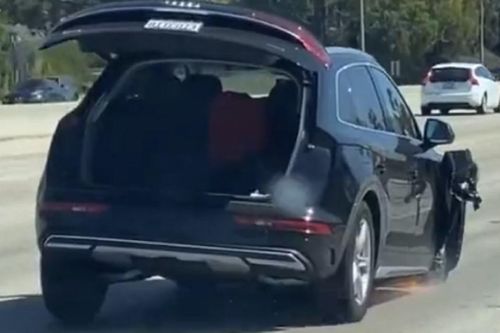 Người phụ nữ lái xe Audi còn 3 bánh chạy như bay trên đường