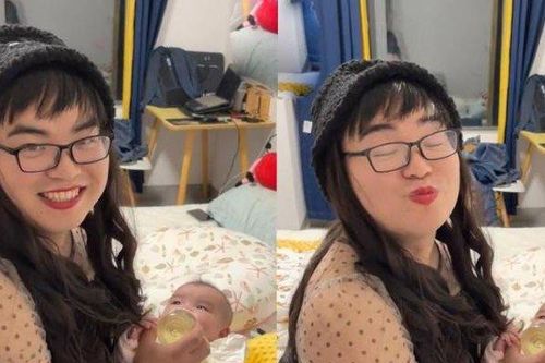 Ông bố hào hứng cho con bú bình khiến ai cũng phì cười