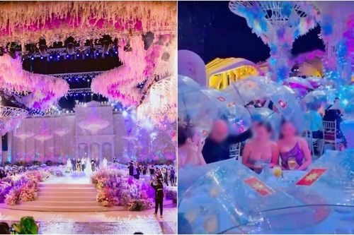 Lễ cưới trăm tỉ ở Kiên Giang, mỗi người cầm 1 chiếc ô và netizen cảm thán: 'Ngồi ăn cũng kiểu mui trần'