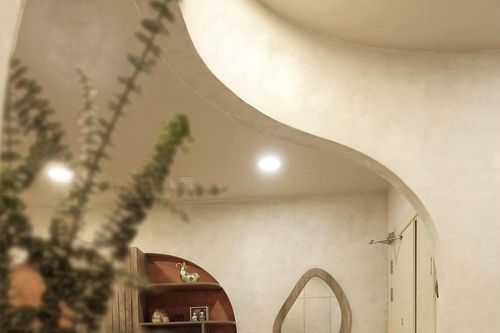 Căn hộ 75m2 phong cách Wabi-sabi tạo không gian mở bằng vách cong