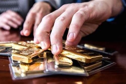 Giá vàng trong nước và thế giới đồng loạt giảm nhẹ sau quyết định 'diều hâu' của Fed