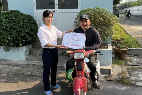 Người đàn ông bị liệt hạnh phúc vì được nhiều người thương