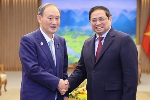Thủ tướng Phạm Minh Chính tiếp nguyên Thủ tướng Nhật Bản Suga Yoshihide