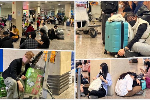 Hành khách vạ vật ở sân bay Tân Sơn Nhất đợi chuyến bay về quê đón Tết