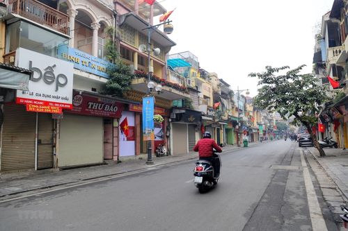 Người Hà Nội đón Xuân mới trong sự nhẹ nhàng, tươi vui