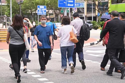 Singapore hạ cấp độ dịch Covid-19 xuống mức thấp nhất, ngang với cúm H7N9