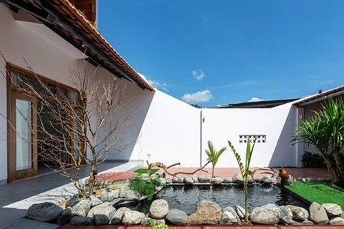 Ngôi nhà xây gạch thẻ để mộc tạo không gian thiên nhiên gần gũi