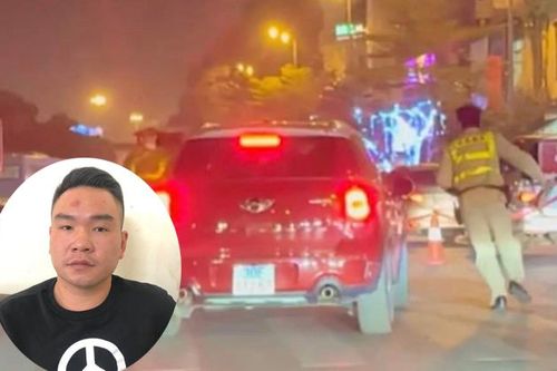 Tạm giữ hình sự lái xe hất văng Cảnh sát giao thông lên nắp capo khi bị thổi 'cồn'