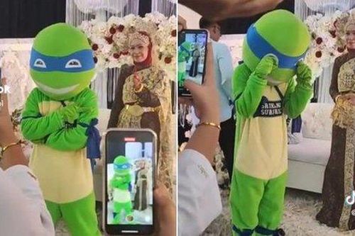 Bạn gái yêu 8 năm đi lấy người khác, chàng trai đóng giả làm 'Ninja rùa' dự đám cưới trong nước mắt