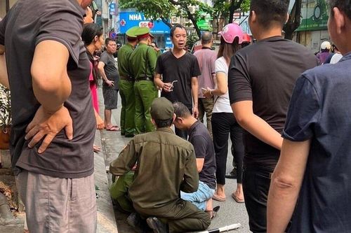 Công an Hà Nội truy tìm tài xế hất văng cảnh sát lên nắp capo
