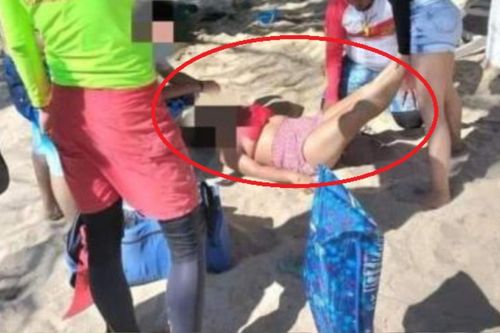 Đang nằm tắm nắng trên bờ biển, người phụ nữ gặp họa 'từ trên trời rơi xuống'