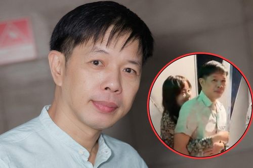 Bà xã Thái Hòa ôm chặt chồng tại rạp chiếu phim, để lộ nhan sắc gây sốc ở độ tuổi U40