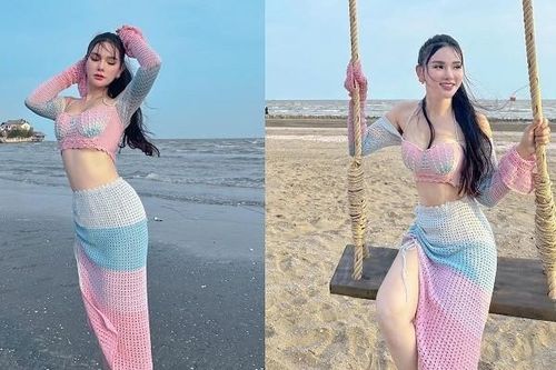'Mẹ 2 con' Thu Thủy kín đáo đi biển vẫn gợi cảm hút mắt