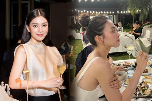 Ảnh hưởng hậu tin đồn quen đại gia, Hoa hậu Tiểu Vy 'trầm tư' uống rượu giải sầu