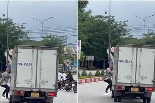 Nam thanh niên đu bám cửa kính xe tải để chặn đánh tài xế