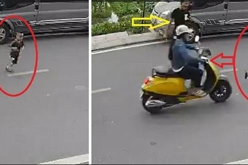 Để con nhỏ sang đường va vào xe điện, ông bố giở thói côn đồ đánh người