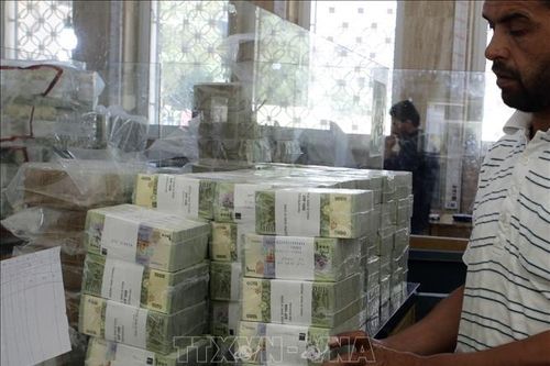 Syria: Tăng 50% lương cho khu vực công do lạm phát cao