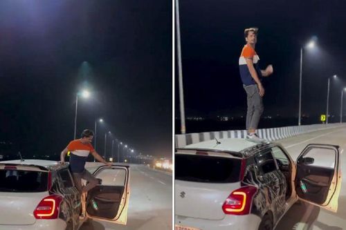 Ô tô đang chạy, tài xế mở cửa leo lên nóc xe tạo dáng quay video đăng mạng