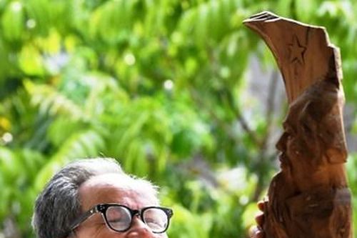 Nghị lực phi thường của một họa sĩ thương binh