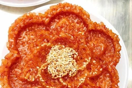Cách nấu xôi gấc lên màu đẹp, thơm dẻo cúng Tất niên
