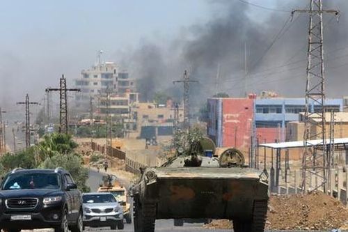 Khói lớn bốc lên từ Bộ Quốc phòng Syria sau đòn không kích của Israel