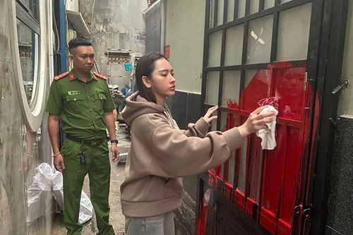 Cô gái bị bắt tạm giam vì tạt sơn nhà người yêu cũ