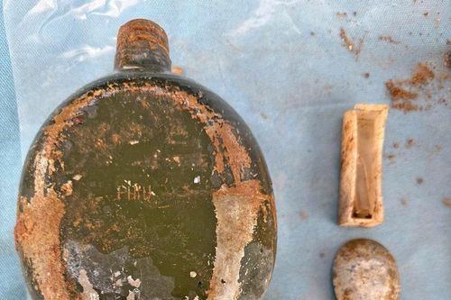 Gia Lai: Phát hiện di vật có chữ 'PHIU' khi khai quật mộ liệt sĩ phục vụ công tác giám định ADN