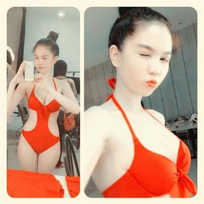 Với làn da trắng sứ, ba vòng "chuẩn không cần chỉnh", bộ bikini màu đỏ cùng đường cắt khoét tinh tế là lựa chọn hoàn hảo cho Ngọc Trinh khoe dáng.