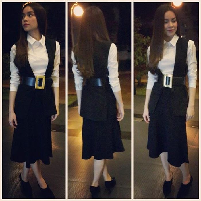 Cách kết hợp khéo léo của cô với áo gillet, sơ mi, váy chữ A gợi cảm với chiếc thắt lưng đen ấn tượng. 