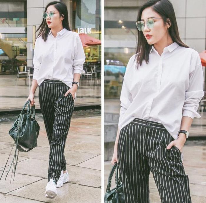 Văn Mai Hương gây bất ngờ với thời trang khỏe khoắn với sơ mi trắng, quần kẻ, sneaker khi xuống phố.