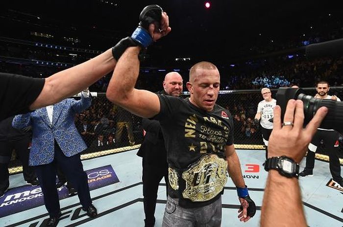 Với chiến thắng trước Bisping, St-Pierre trở thành võ sĩ thứ 4 trong lịch sử nắm giữ đai vô địch UFC ở hai hạng cân. Võ sĩ 36 tuổi đồng thời lập luôn kỷ lục khi là người có số trận thắng nhiều nhất giải đấu (20 trận).